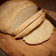 Illustration for article titled The Best Way to Acquire Even Rounds of Bread is with a Bread Slicerem/em